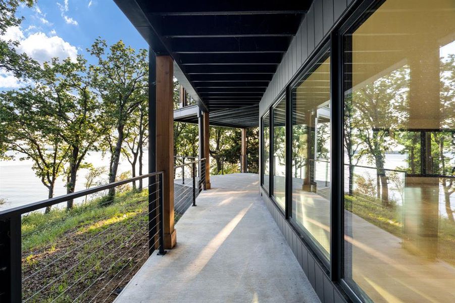 Exterior details and patio area of a home in , Oak Point (Image 3).