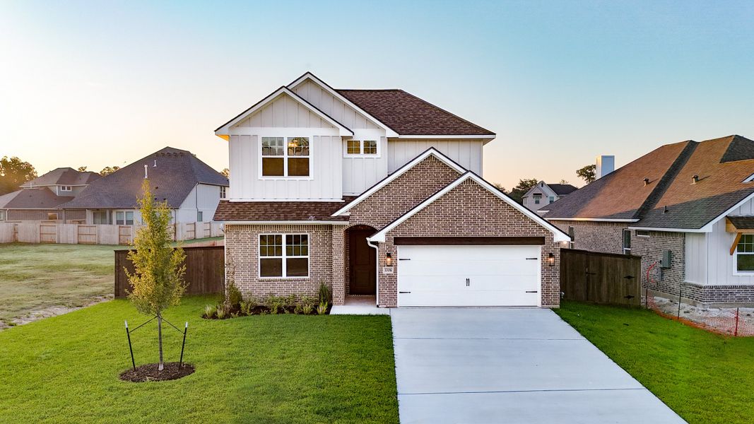 Front exterior of a new home in Mission Ranch, College Station, TX, highlighting curb appeal (Image 26).