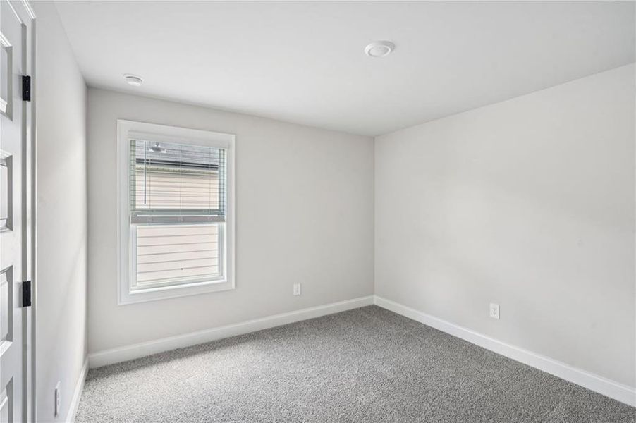 Spacious, unfurnished interior of a new home in Martin Springs - Estate Series, Lawrenceville (Image 15).