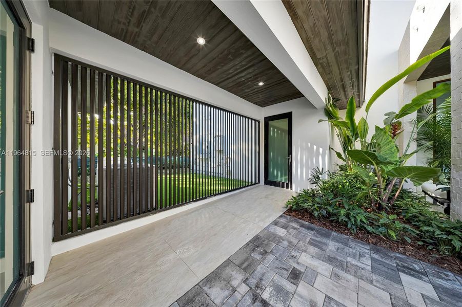 Exterior details and patio area of a home in , Miami (Image 27). Exterior details and patio area of a home in , Miami (Image 27).