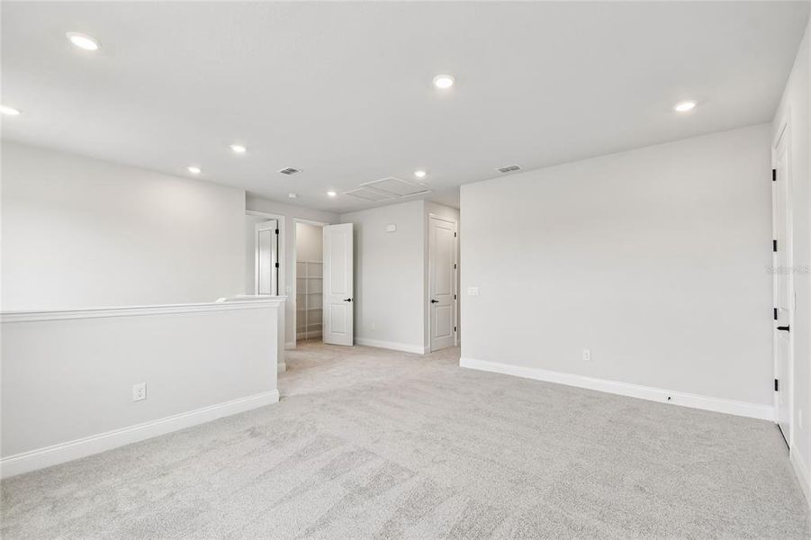 Spacious, unfurnished interior of a new home in Oakfield at Mount Dora Village Series, Mount Dora (Image 23).