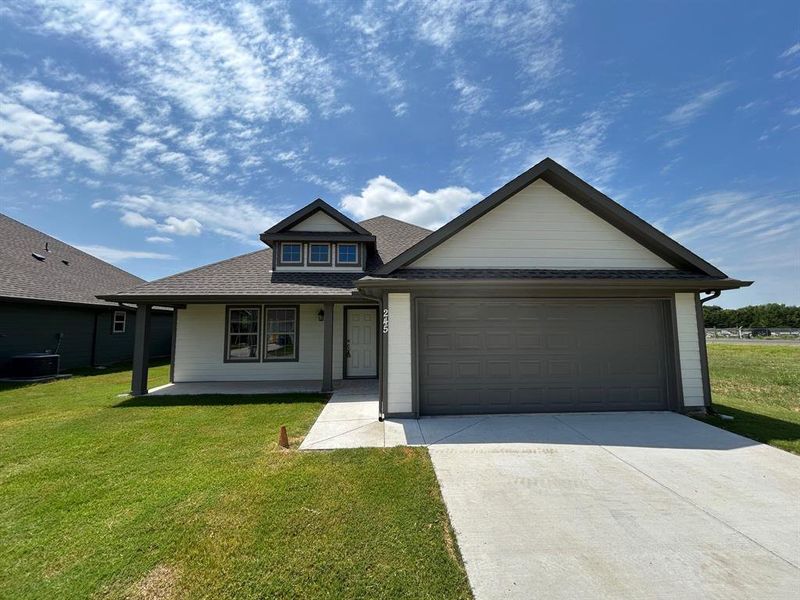 Front exterior of a new home in , Trenton, TX, highlighting curb appeal (Image 23). Front exterior of a new home in , Trenton, TX, highlighting curb appeal (Image 23).