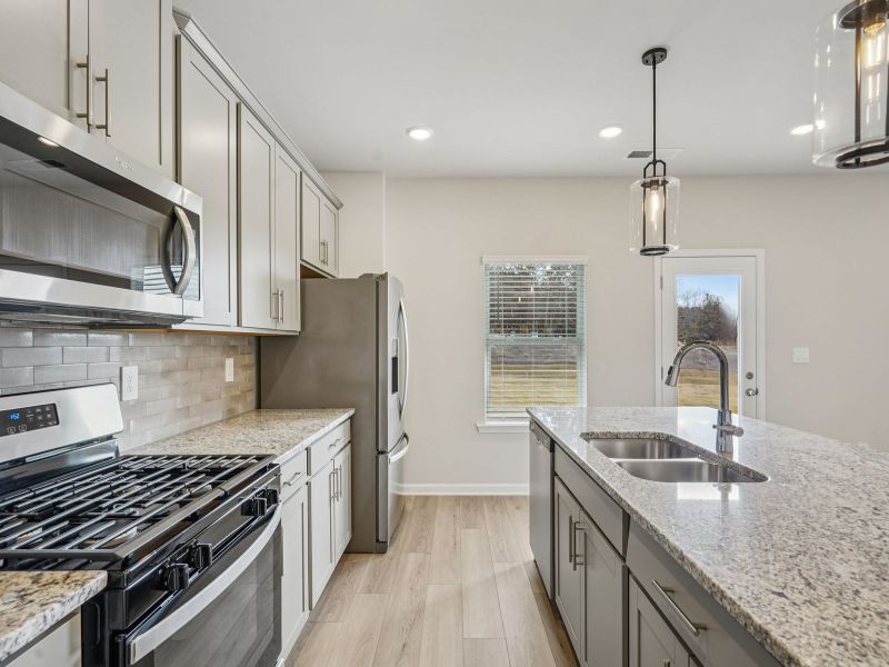 Furnished interior view inside a new home in Avalon - Reserve Series, Conyers (Image 7).