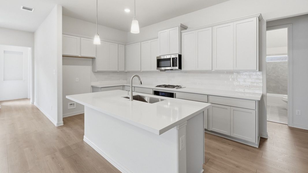 Furnished interior view inside a new home in Thompson Farms, Van Alstyne (Image 6).