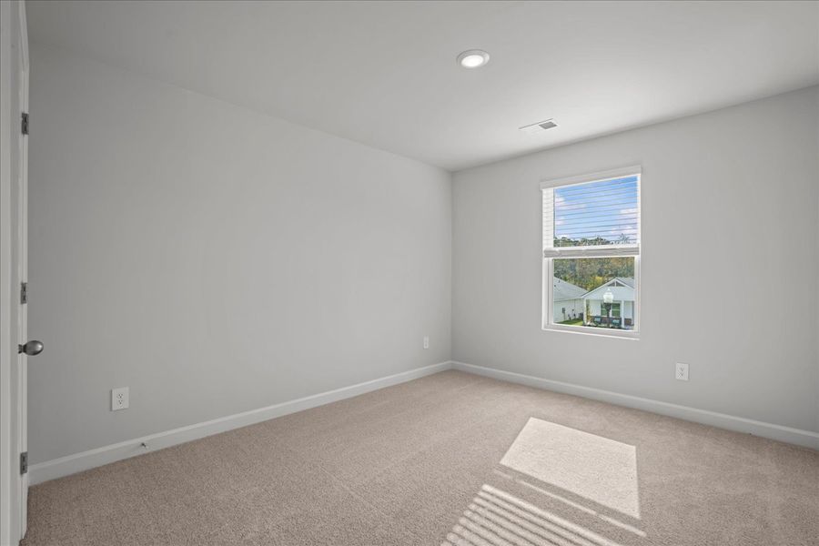 Spacious, unfurnished interior of a new home in The Farm at Wells Creek - Signature Collection, Gray Court (Image 13).