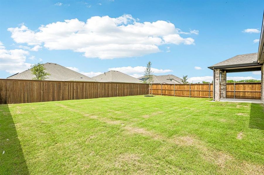 Exterior details and patio area of a home in Overland Grove, Forney (Image 15).