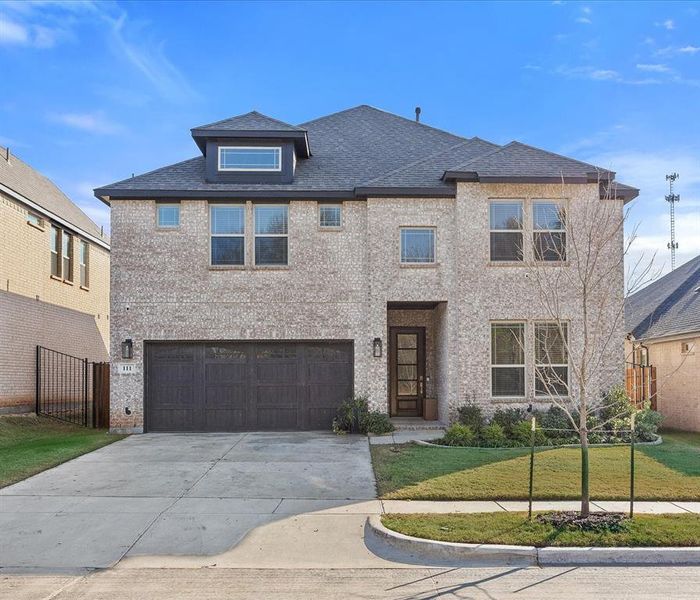 Front exterior of a new home in The Lakes at Parks of Aledo, Aledo, TX, highlighting curb appeal (Image 1).