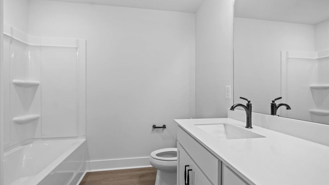 Accomplished full bath designed with both comfort and sophistication in mind at Silo Ridge by DRB Homes in Anderson, SC