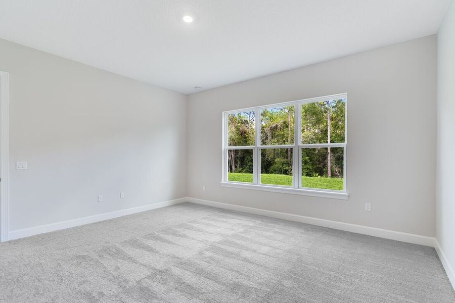 Representative unfurnished interior of a home built from the Letizia by Taylor Morrison in Esplanade at Center Lake Ranch, St. Cloud (Image 25).