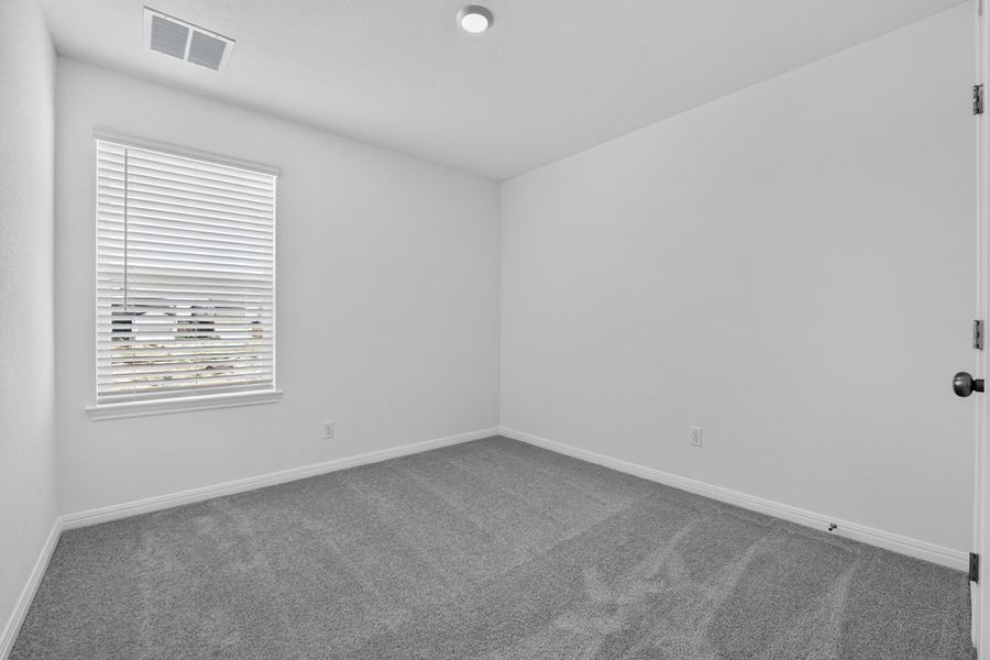 Spacious, unfurnished interior of a new home in Sunfield, Buda (Image 32).