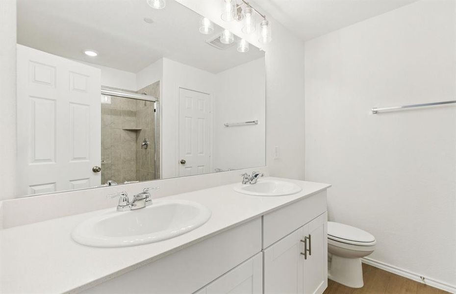 Owner's private bath with double vanity