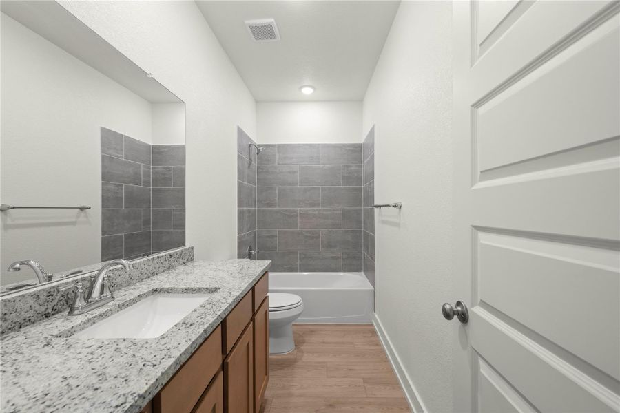Please Note: These interior photos are not of the actual home but are of a completed one with a simialr floor plan. Finishes, features, and layouts may vary.