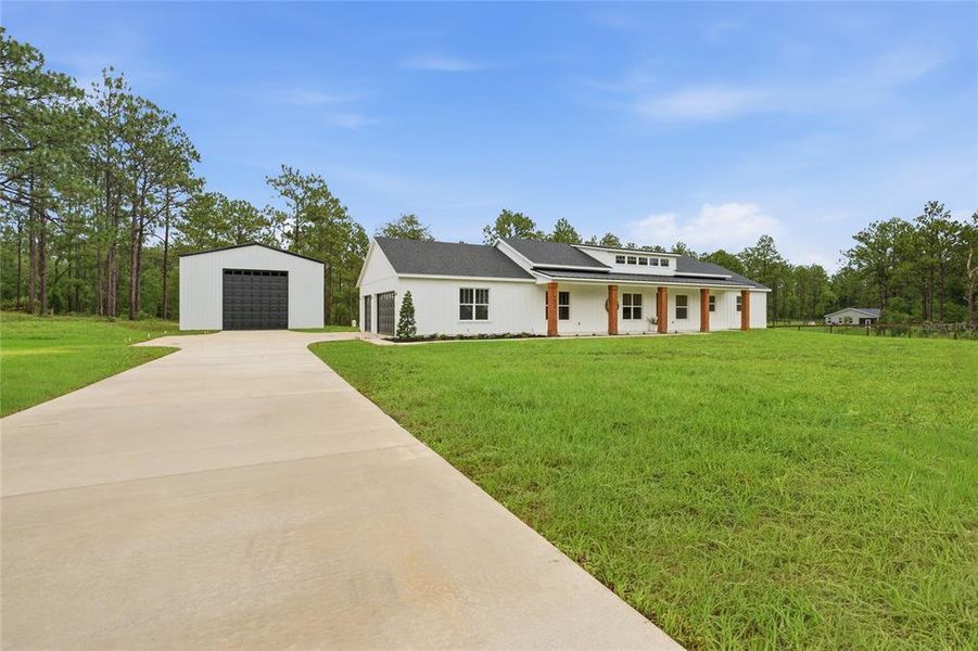 Front exterior of a new home in , Ocala, FL, highlighting curb appeal (Image 22).