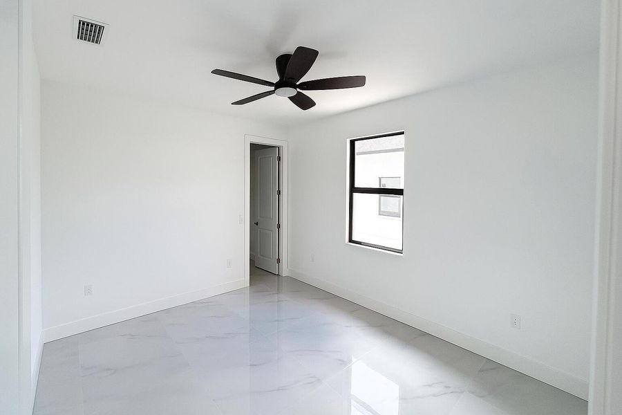Spacious, unfurnished interior of a new home in , Cape Coral (Image 9). Spacious, unfurnished interior of a new home in , Cape Coral (Image 9).