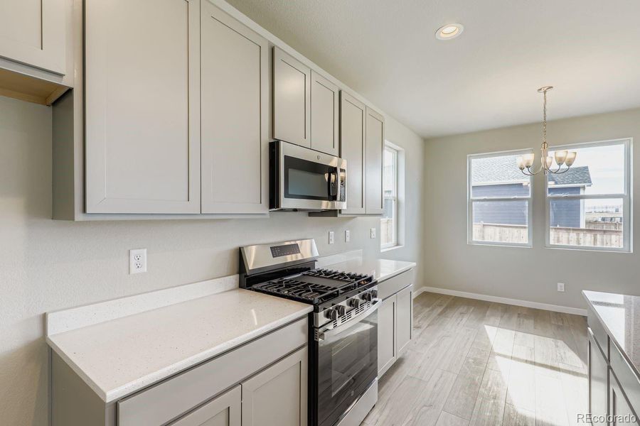 Furnished interior view inside a new home in , Commerce City (Image 6).