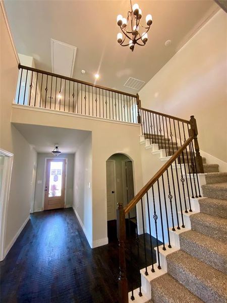 Elegant staircase with wrought iron spindles Elegant staircase with wrought iron spindles