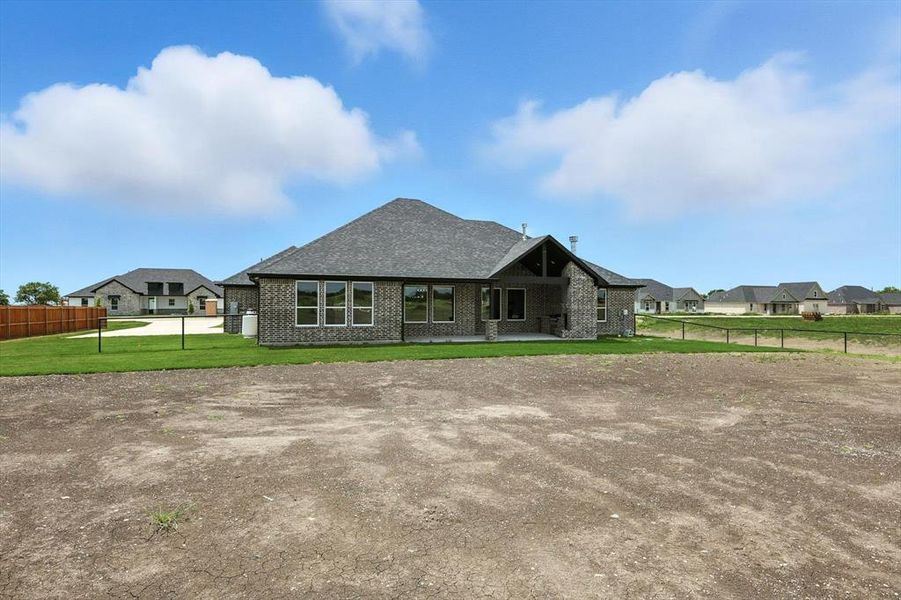 Front exterior of a new home in , Sanger, TX, highlighting curb appeal (Image 1). Front exterior of a new home in , Sanger, TX, highlighting curb appeal (Image 1).