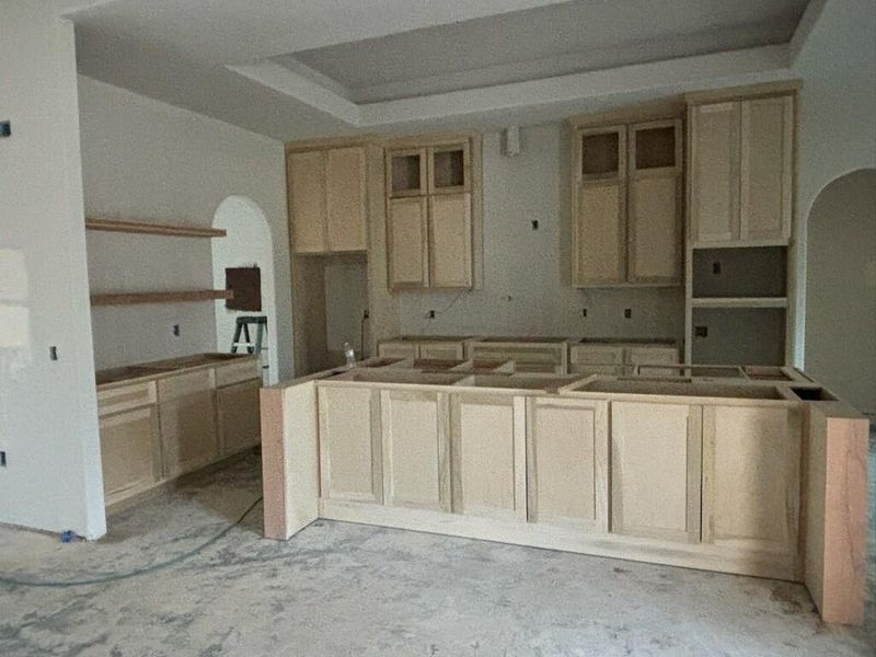 Shaker style oak cabinets.