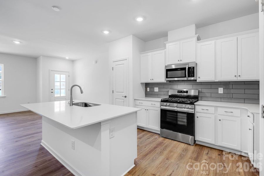 Furnished interior view inside a new home in Cannon Village, York (Image 3).