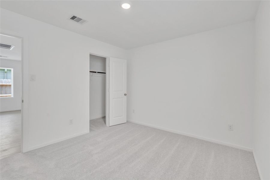 Spacious, unfurnished interior of a new home in Tavola: Cottage Collection, New Caney (Image 13).