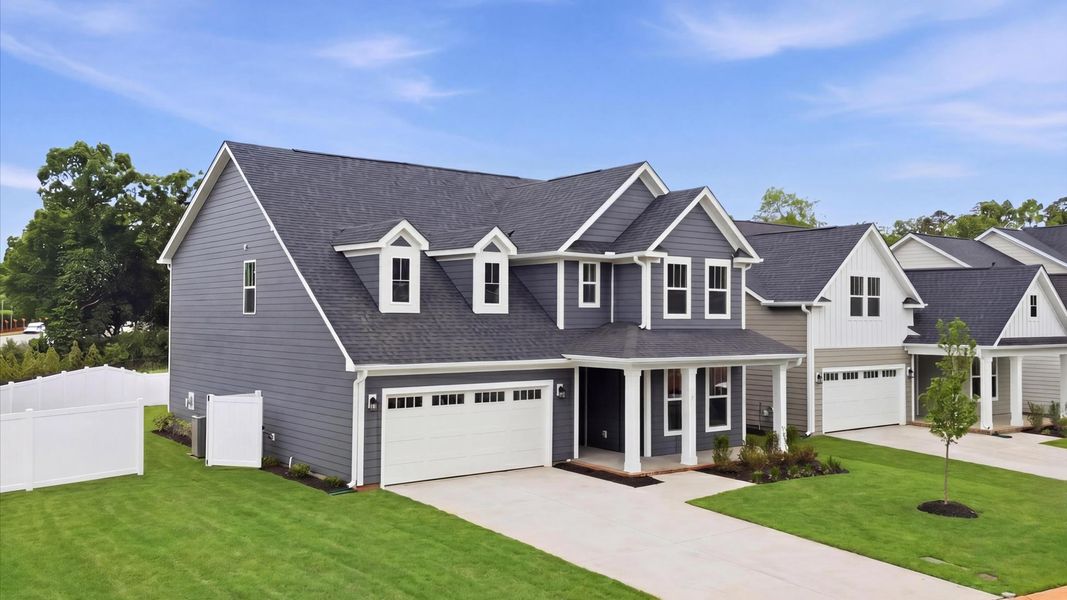 Refined exterior design with balanced architectural detail in this distinguished two-story home at Pelham Crossing