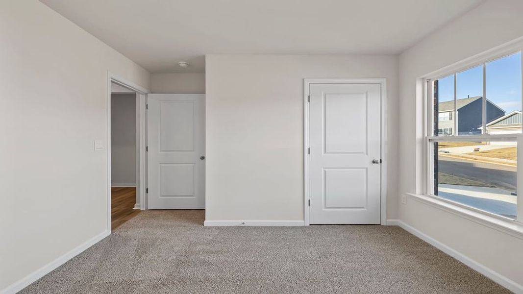 Spacious, unfurnished interior of a new home in Lakestone, Woodruff (Image 15).