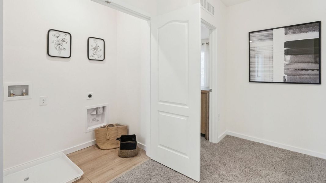 Representative furnished interior of a home built from the Holly by D.R. Horton in Oak Pointe, Apopka (Image 16).