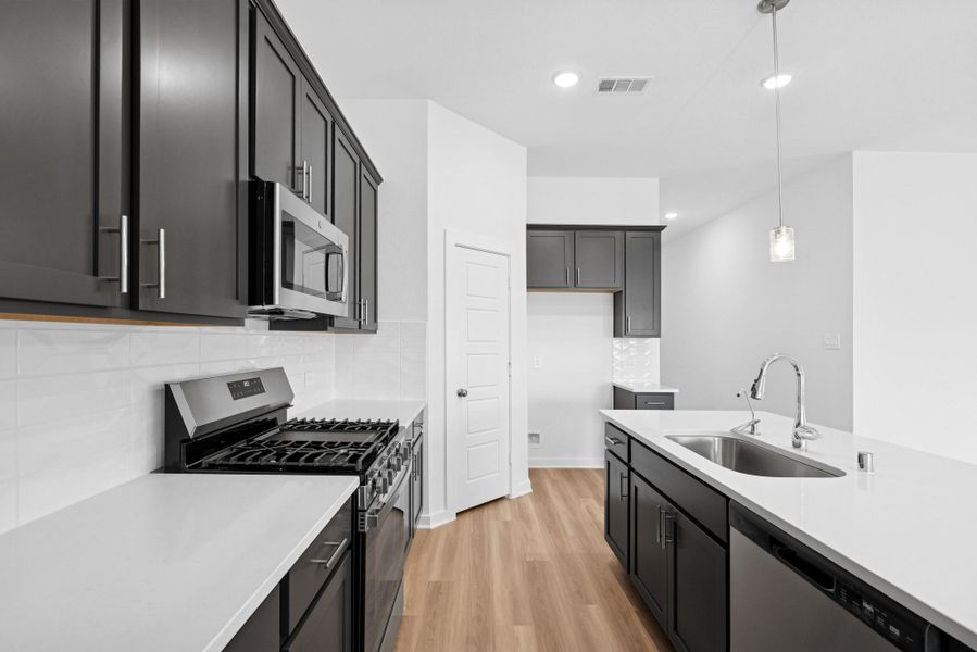 Furnished interior view inside a new home in Pinewood at Grand Texas, New Caney (Image 5).