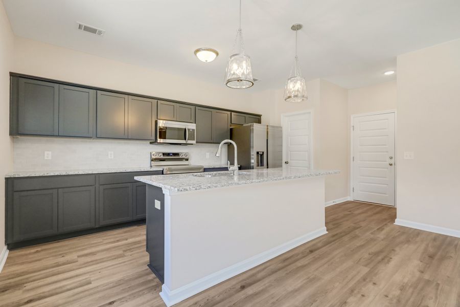 Representative furnished interior of a home built from the The Bagley by RTS Homes in Grand Reserve, Hinesville (Image 7).