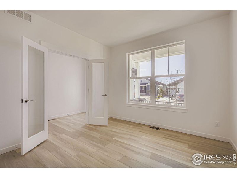 Spacious, unfurnished interior of a new home in RainDance - 60s, Windsor (Image 22).
