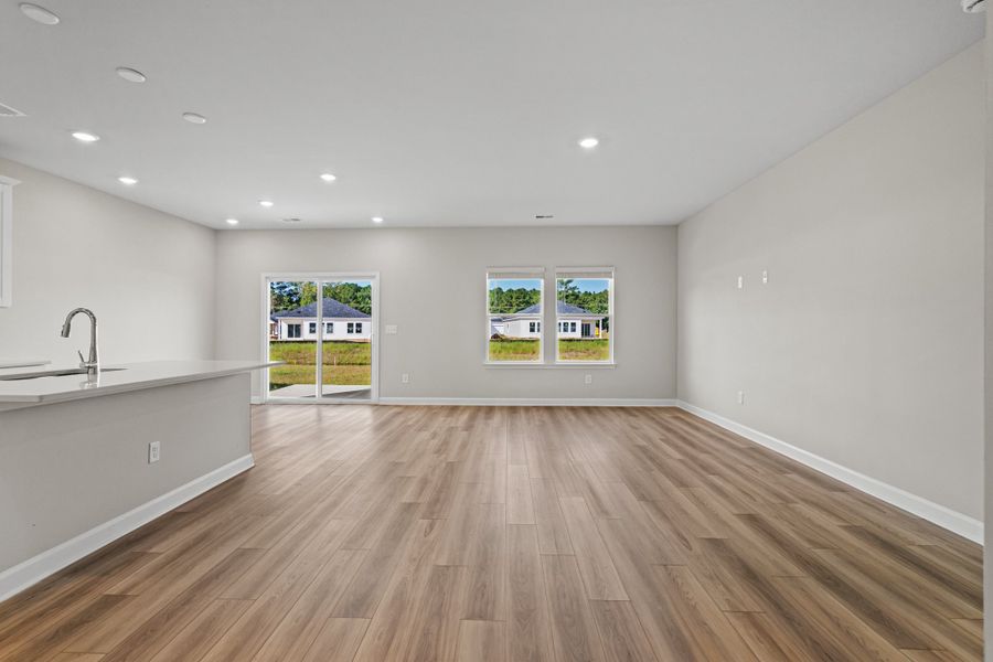 Spacious, unfurnished interior of a new home in Cypress Ridge - The Boardwalk Series, Longs (Image 10).