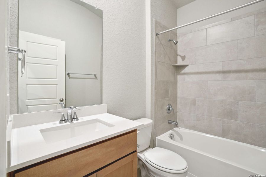 Furnished interior view inside a new home in Estancia Ranch - Classic Series, San Antonio (Image 7).