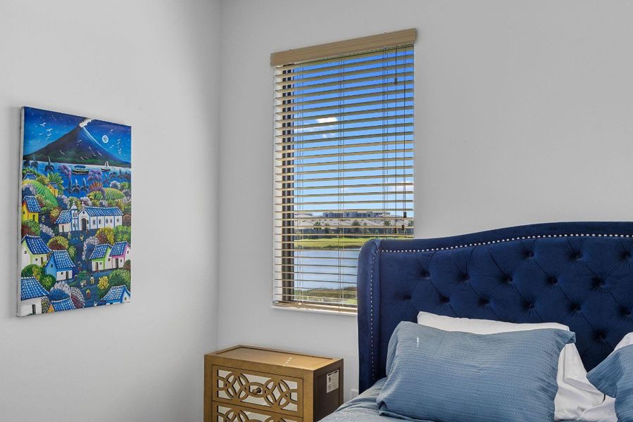 Bedroom with a water view