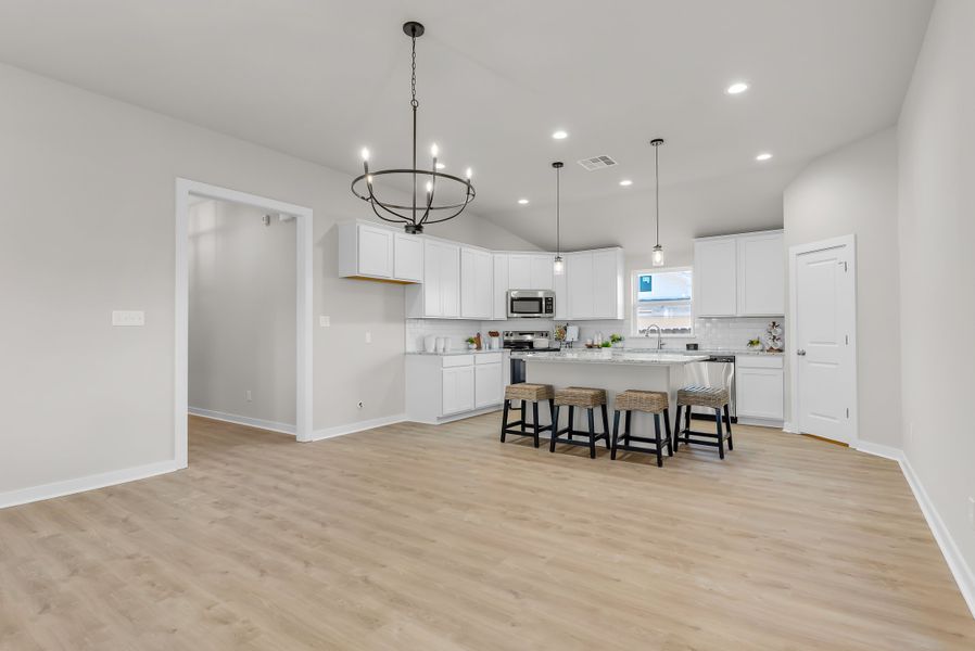 Representative furnished interior of a home built from the The Poppy by Avonley Homes in Rudder Pointe, Bryan (Image 24).