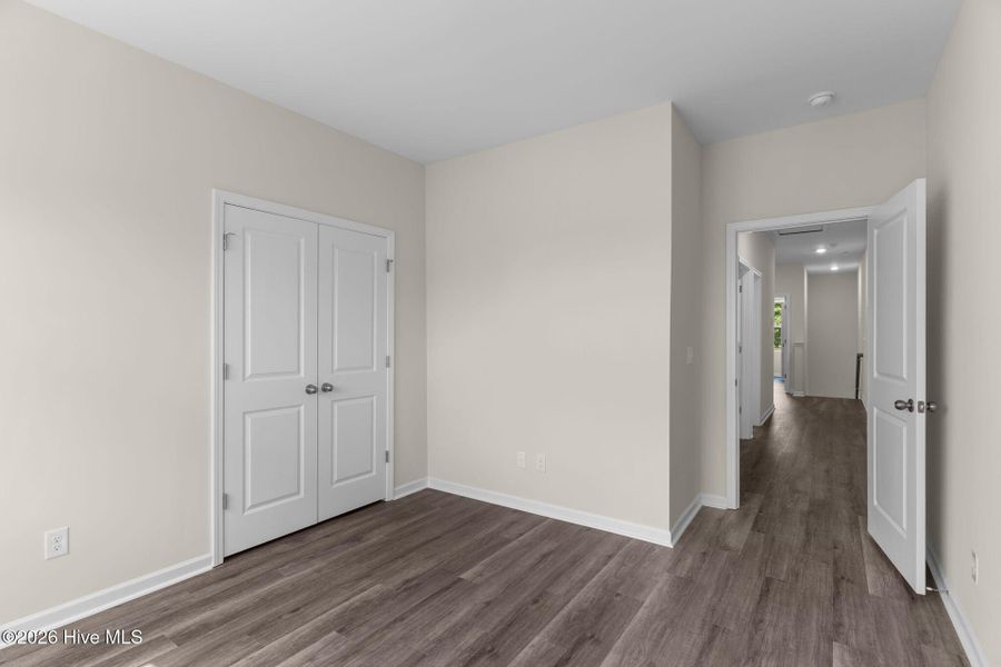 Spacious, unfurnished interior of a new home in Coastal Haven Townes, Leland (Image 31).