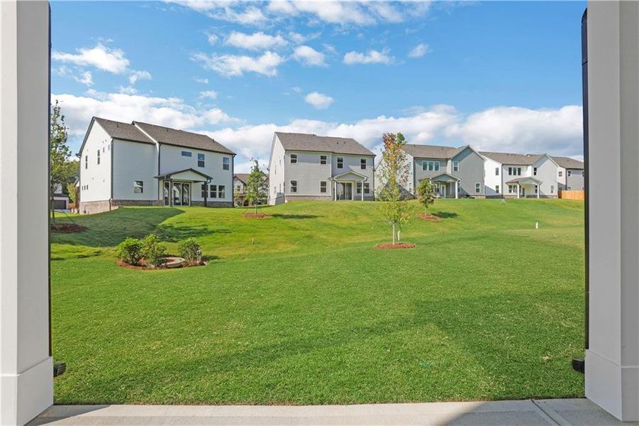 Exterior details and patio area of a home in The Paddocks at Doc Hughes, Buford (Image 2).