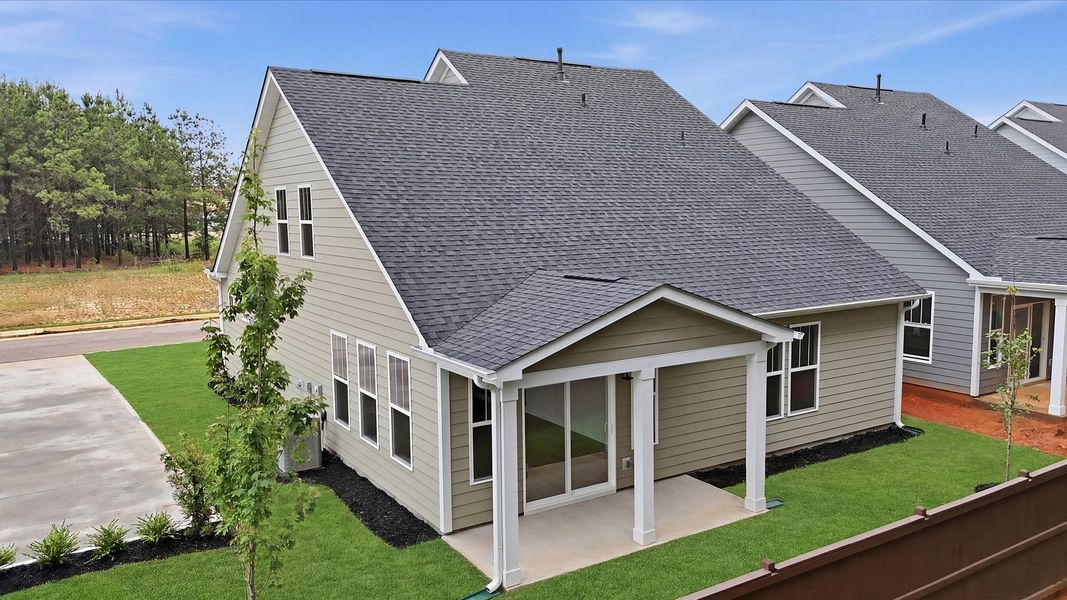 Exterior details and patio area of a home in Barton Hollow Single Family Homes, Fountain Inn (Image 21).