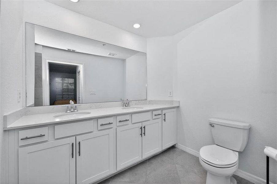 Furnished interior view inside a new home in Wellen Park Golf & Country Club, Venice (Image 15).