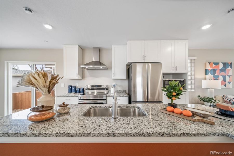 Furnished interior view inside a new home in Reunion, Commerce City (Image 10).