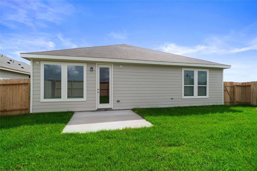 Step outside to this inviting private, fenced backyard with ample green space. From al fresco dining and weekend BBQs to a custom outdoor lounge, this versatile space provides the perfect foundation to create your own private oasis.