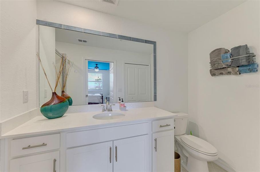 Furnished interior view inside a new home in Wellen Park Golf & Country Club, Venice (Image 28).