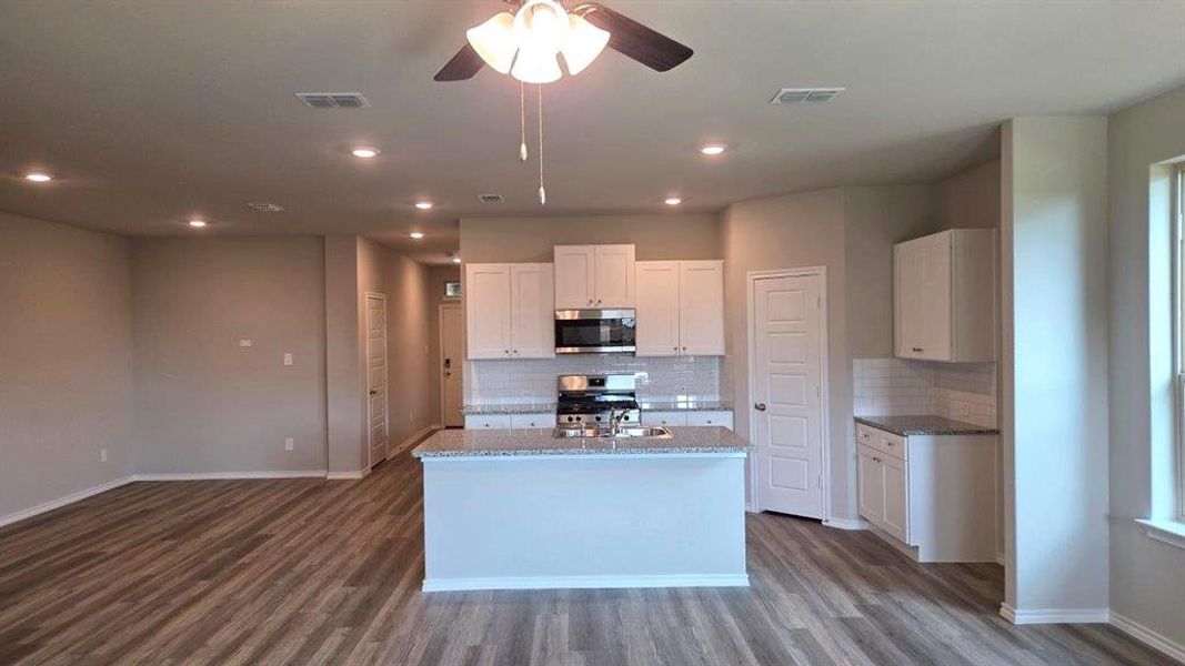 Kitchen - All Home and community information, including pricing, included features, terms, availability and amenities, are subject to change at any time without notice or obligation. All Drawings, pictures, photographs, video, square footages, floor plans, elevations, features, colors and sizes are approximate for illustration purposes only and will vary from the homes as built.