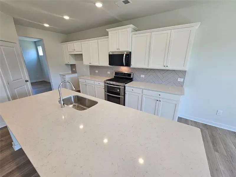 Furnished interior view inside a new home in The Estates at Gainesville Township, Gainesville (Image 6).