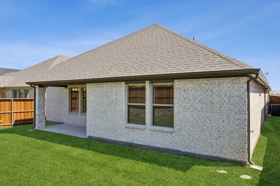 Patio in the Oscar home plan by Trophy Signature Homes – REPRESENTATIVE PHOTO Patio in the Oscar home plan by Trophy Signature Homes – REPRESENTATIVE PHOTO