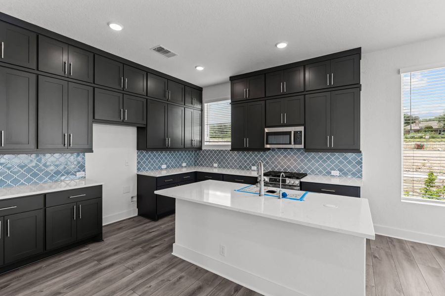 Furnished interior view inside a new home in Centero at Stone Oak, San Antonio (Image 9).