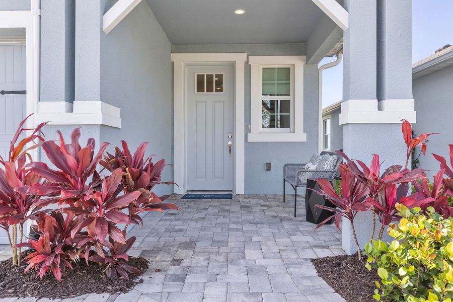 Exterior details and patio area of a home in The Sanctuary – Coastal Collection, Punta Gorda (Image 3).