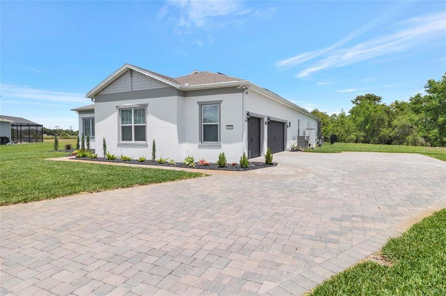 Front exterior of a new home in , Orlando, FL, highlighting curb appeal (Image 29).