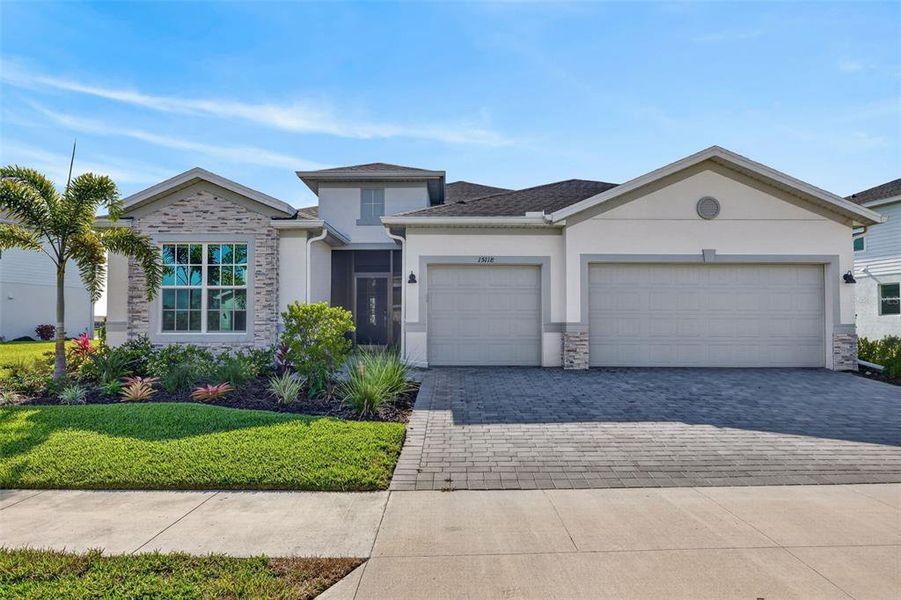 Front exterior of a new home in , Punta Gorda, FL, highlighting curb appeal (Image 2). Front exterior of a new home in , Punta Gorda, FL, highlighting curb appeal (Image 2).