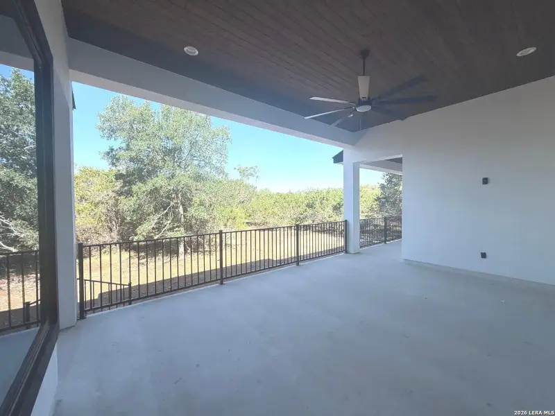 Exterior details and patio area of a home in , Spring Branch (Image 32).