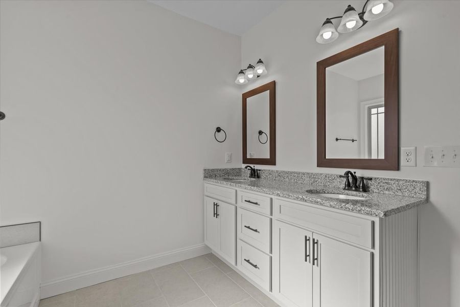 Representative furnished interior of a home built from the Converse by Enchanted Homes in Messer Farms, Inman (Image 11).